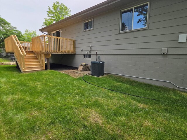 108 E Philip St, Des Moines, IA 50315 - back of house featuring stairway, a wooden deck, and central air condition unit