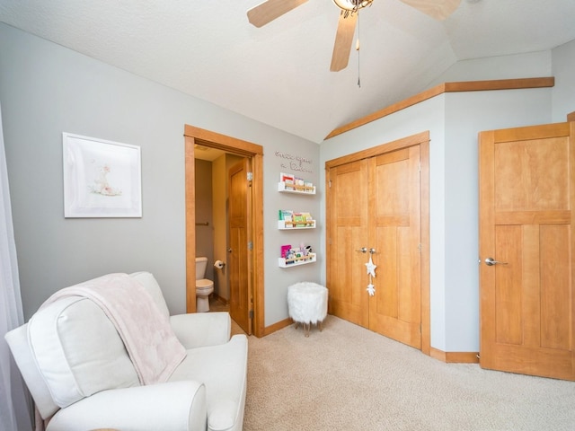 15903 Winston Ave, Urbandale, IA 50323 - sitting room featuring carpet, vaulted ceiling, ceiling fan, and baseboards