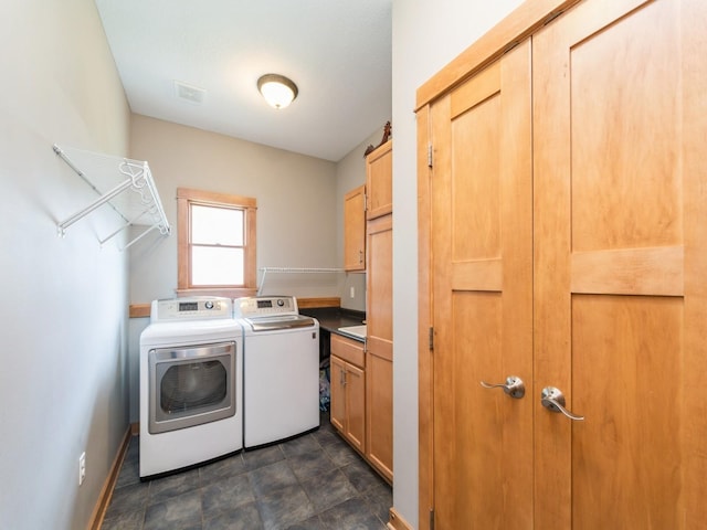 15903 Winston Ave, Urbandale, IA 50323 - laundry room with cabinet space, independent washer and dryer, and baseboards