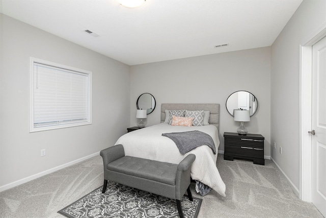6744 NE 12th Ct, Des Moines, IA 50313 - carpeted bedroom featuring baseboards