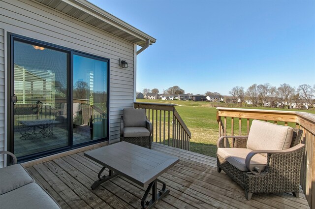 6744 NE 12th Ct, Des Moines, IA 50313 - wooden terrace featuring a lawn and a residential view