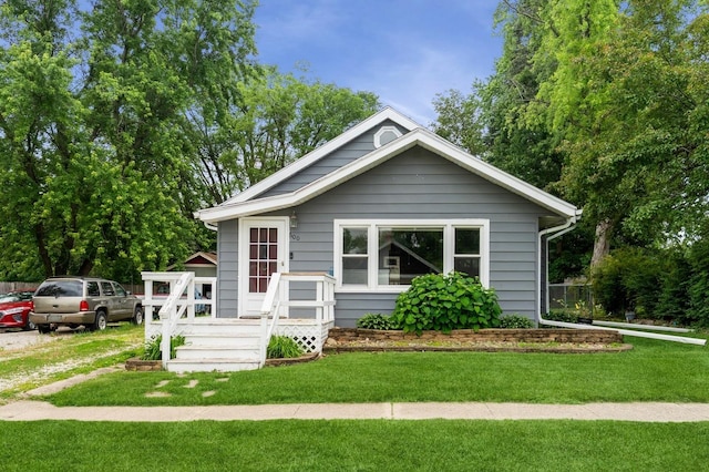 600 SE 2nd St, Grimes, IA 50111 - view of front of house featuring a front yard