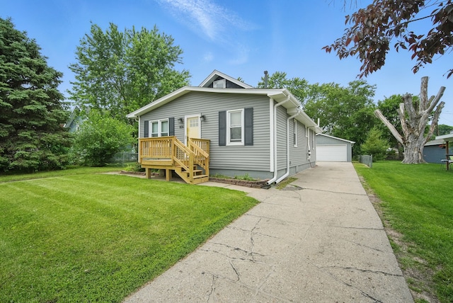 806 8th St, West Des Moines, IA 50265 - view of front of home with a garage, an outbuilding, and a front yard