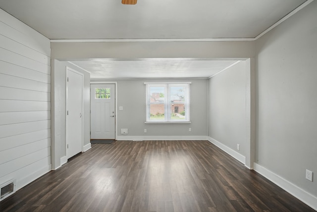 806 8th St, West Des Moines, IA 50265 - unfurnished living room with dark wood finished floors and crown molding