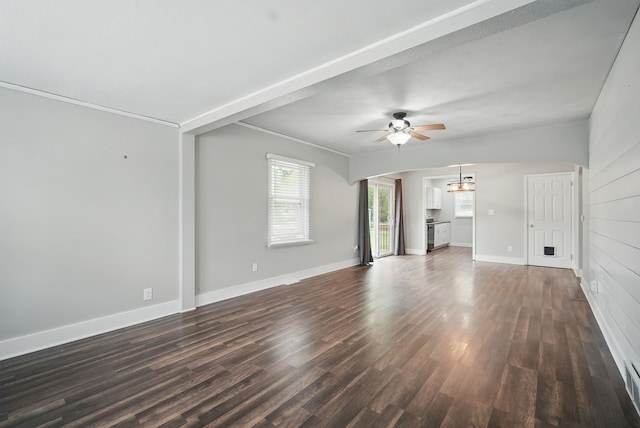 806 8th St, West Des Moines, IA 50265 - unfurnished living room with a ceiling fan, dark wood finished floors, and a chandelier
