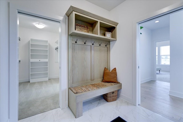 3736 NW 183rd St, Clive, IA 50325 - mudroom featuring baseboards, light marble finish floors, and recessed lighting