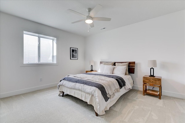 3736 NW 183rd St, Clive, IA 50325 - bedroom with baseboards, light carpet, and ceiling fan