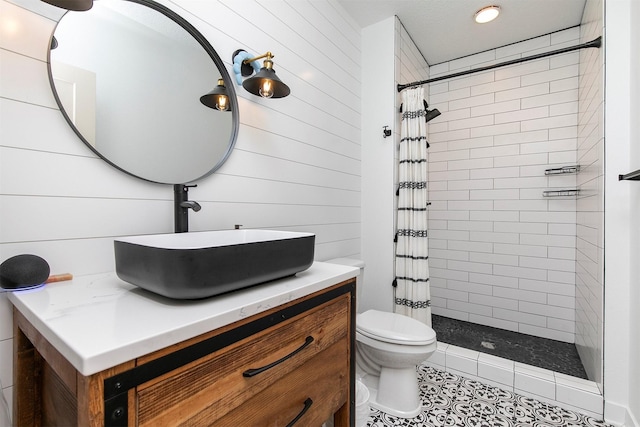 460 NE Bowman Dr, Waukee, IA 50263 - bathroom featuring a tile shower, toilet, vanity, tile patterned floors, and wood walls