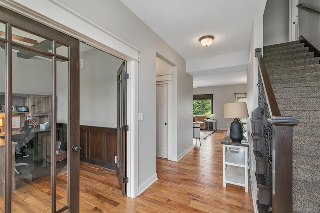 460 NE Bowman Dr, Waukee, IA 50263 - foyer entrance featuring light wood-style floors and stairs