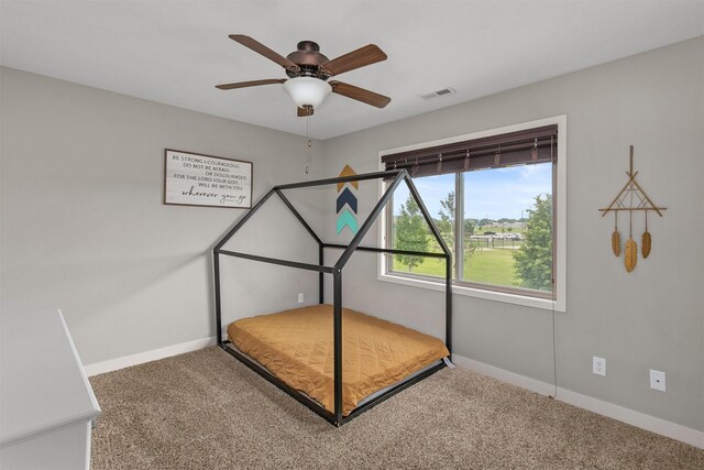 460 NE Bowman Dr, Waukee, IA 50263 - unfurnished bedroom featuring carpet flooring, baseboards, and ceiling fan