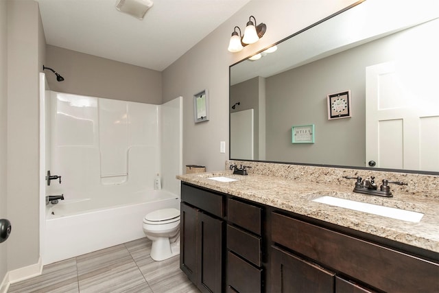 460 NE Bowman Dr, Waukee, IA 50263 - bathroom with toilet, double vanity, and shower / tub combination