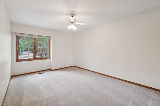 313 29th St, West Des Moines, IA 50265 - empty room with carpet floors, baseboards, and ceiling fan