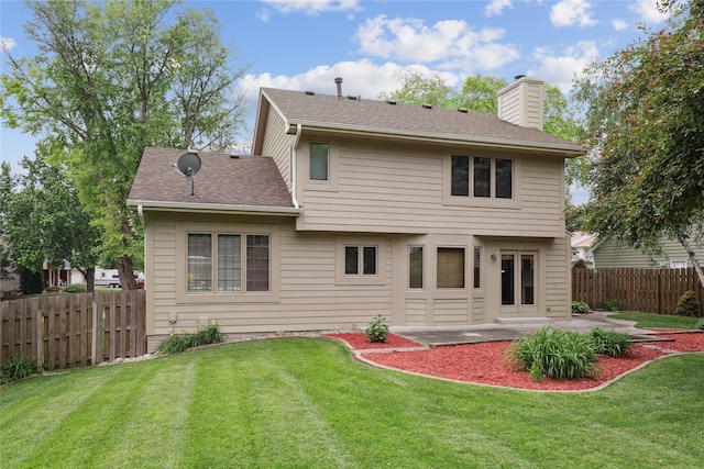 313 29th St, West Des Moines, IA 50265 - back of property with a patio, a chimney, and a shingled roof
