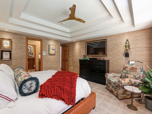 11576 NW Timberbrooke Ln, Grimes, IA 50111 - bedroom featuring a tray ceiling, recessed lighting, and a ceiling fan