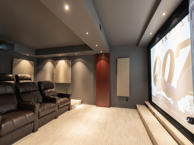 11576 NW Timberbrooke Ln, Grimes, IA 50111 - home theater room featuring carpet floors, recessed lighting, a tray ceiling, and baseboards