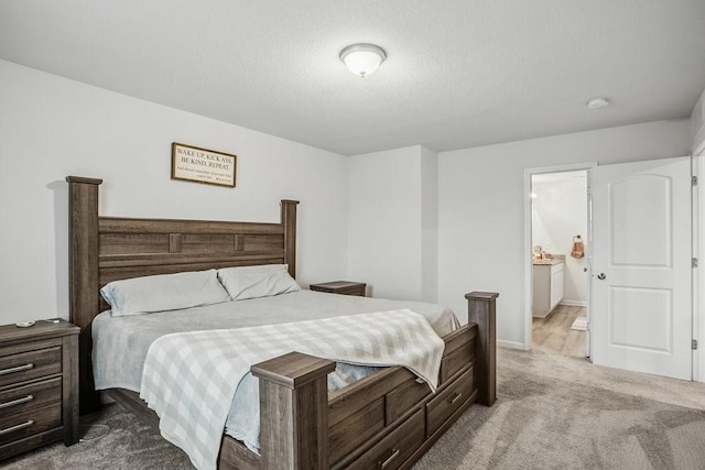 5400 Brook Landing Cir, Des Moines, IA 50317 - carpeted bedroom with ensuite bathroom and baseboards