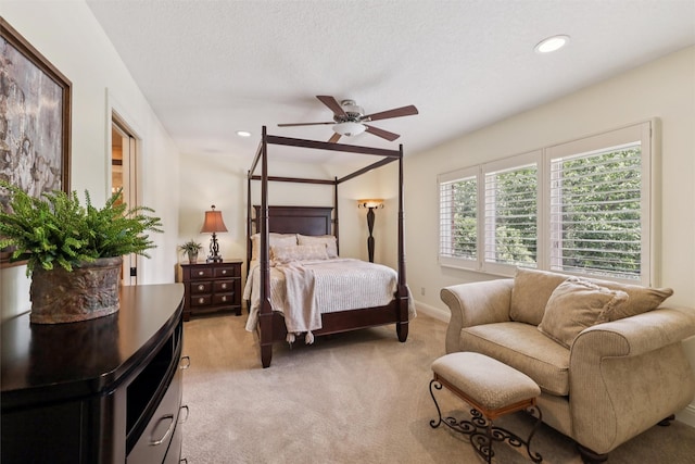 14091 Willow Dr, Clive, IA 50325 - bedroom with light colored carpet, recessed lighting, baseboards, and ceiling fan