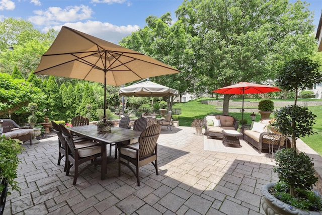 14091 Willow Dr, Clive, IA 50325 - view of patio featuring outdoor dining space and an outdoor hangout area
