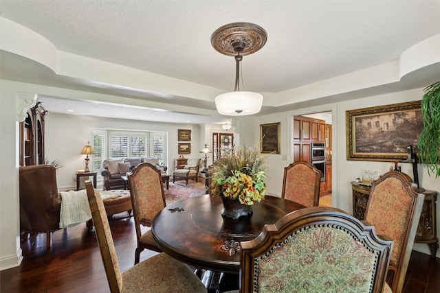 14091 Willow Dr, Clive, IA 50325 - dining room featuring wood finished floors and baseboards