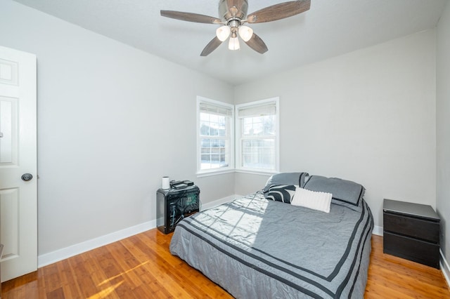 4005 Beaver Ave, Des Moines, IA 50310 - bedroom featuring light wood finished floors, baseboards, and a ceiling fan
