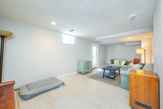 4005 Beaver Ave, Des Moines, IA 50310 - living room with light wood finished floors, baseboards, and recessed lighting