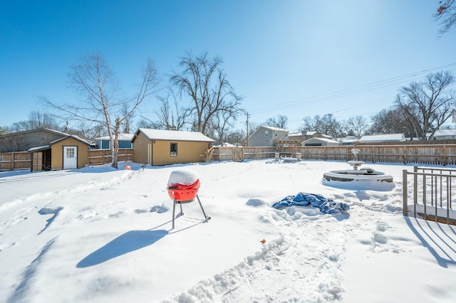 4005 Beaver Ave, Des Moines, IA 50310 - snowy yard featuring a fenced backyard