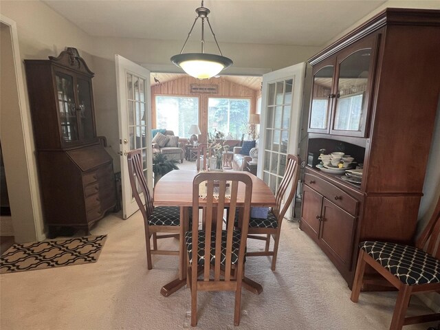 313 E 29th St S, Newton, IA 50208 - dining room with light colored carpet and french doors