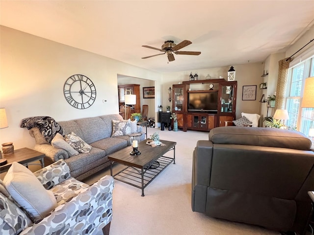 313 E 29th St S, Newton, IA 50208 - carpeted living area with a ceiling fan