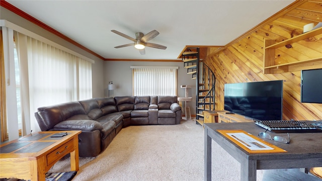 6465 NW 56th St, Johnston, IA 50131 - living area featuring carpet, crown molding, ceiling fan, and wooden walls