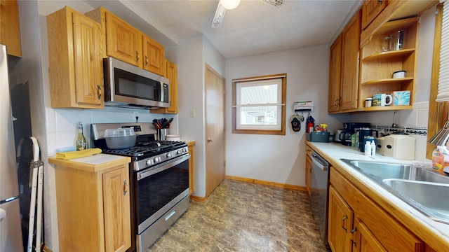 6465 NW 56th St, Johnston, IA 50131 - kitchen featuring stainless steel appliances, light countertops, open shelves, a sink, and baseboards
