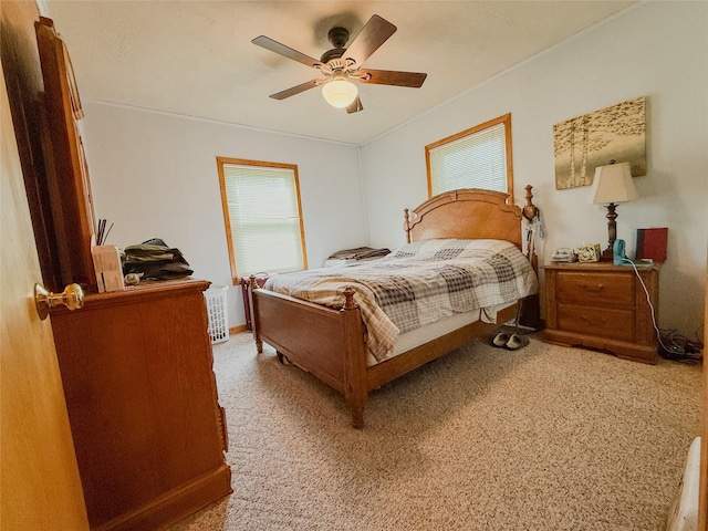 6465 NW 56th St, Johnston, IA 50131 - bedroom featuring carpet flooring and ceiling fan