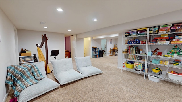 416 S Park St, Stuart, IA 50250 - carpeted living area featuring recessed lighting