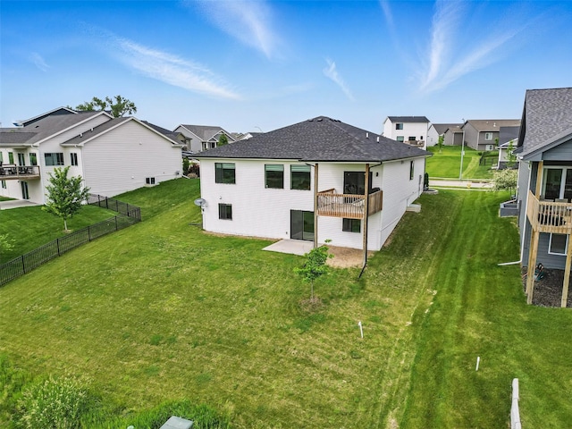 110 Bailey Cir, Waukee, IA 50263 - back of property featuring a residential view, a patio area, and a shingled roof