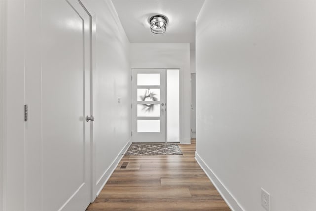110 Bailey Cir, Waukee, IA 50263 - entryway with wood finished floors and baseboards