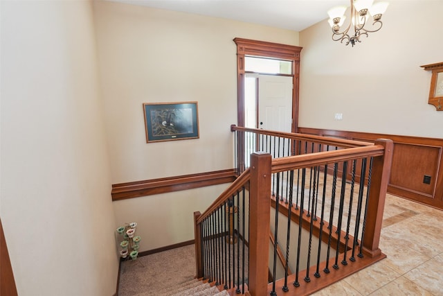 4014 NE Bellagio Cir, Ankeny, IA 50021 - staircase featuring a chandelier