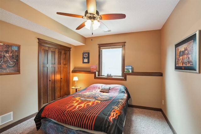 4014 NE Bellagio Cir, Ankeny, IA 50021 - carpeted bedroom featuring baseboards, a ceiling fan, and a closet