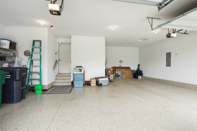 4014 NE Bellagio Cir, Ankeny, IA 50021 - garage with electric panel, a garage door opener, and baseboards