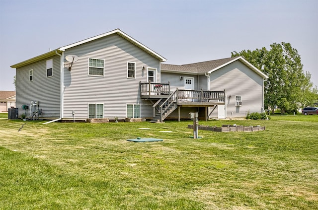 2212 228th Pl, Ames, IA 50014 - back of property featuring a deck, central AC unit, stairway, and a lawn