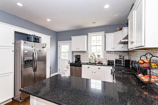 2212 228th Pl, Ames, IA 50014 - kitchen featuring appliances with stainless steel finishes, a sink, range hood, tasteful backsplash, and recessed lighting