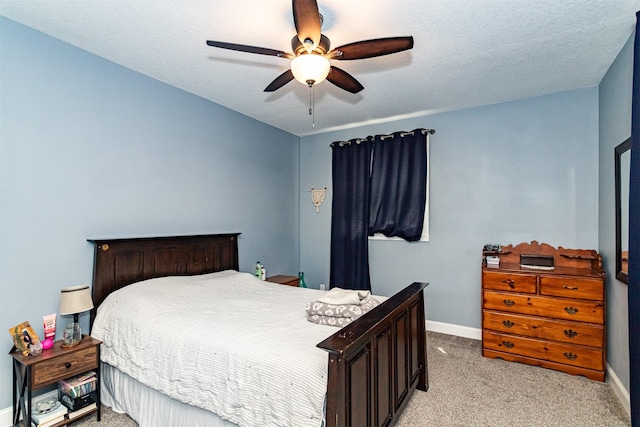 2212 228th Pl, Ames, IA 50014 - bedroom featuring light carpet, baseboards, and ceiling fan