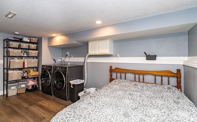 2212 228th Pl, Ames, IA 50014 - bedroom with washer and clothes dryer, wood finished floors, a textured ceiling, and recessed lighting