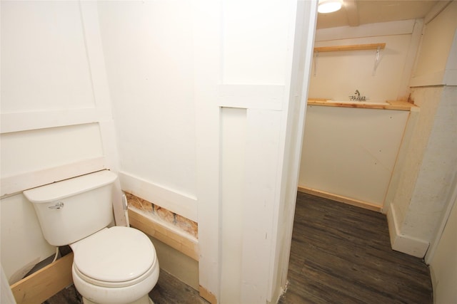 1035 65th St, Windsor Heights, IA 50324 - bathroom with toilet and wood finished floors