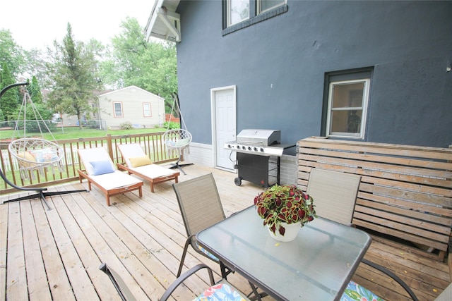1035 65th St, Windsor Heights, IA 50324 - wooden deck featuring grilling area