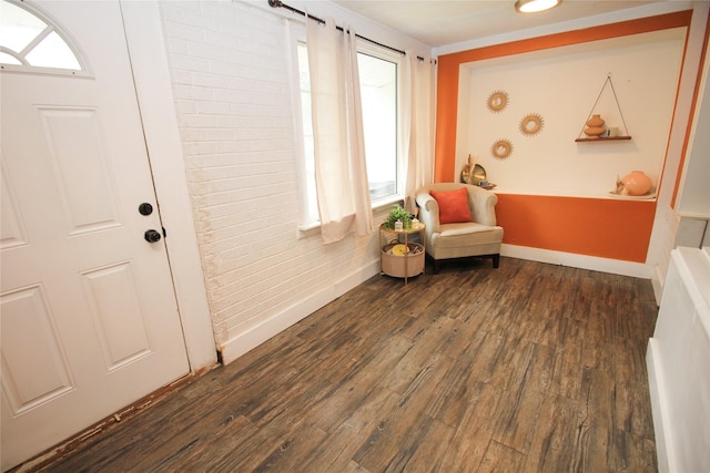 1035 65th St, Windsor Heights, IA 50324 - sitting room with baseboards and dark wood-type flooring