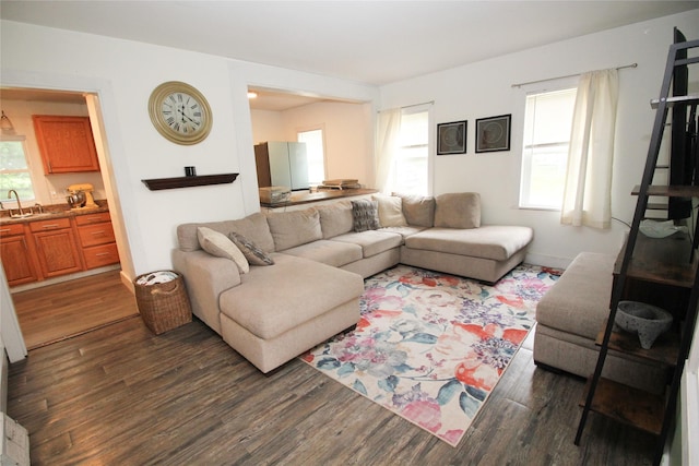 1035 65th St, Windsor Heights, IA 50324 - living room featuring dark wood finished floors and healthy amount of natural light