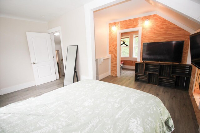 1035 65th St, Windsor Heights, IA 50324 - bedroom with baseboards and wood finished floors