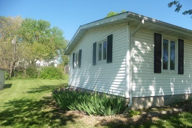 205 Amy Ln, Mount Ayr, IA 50854 - view of property exterior with a yard