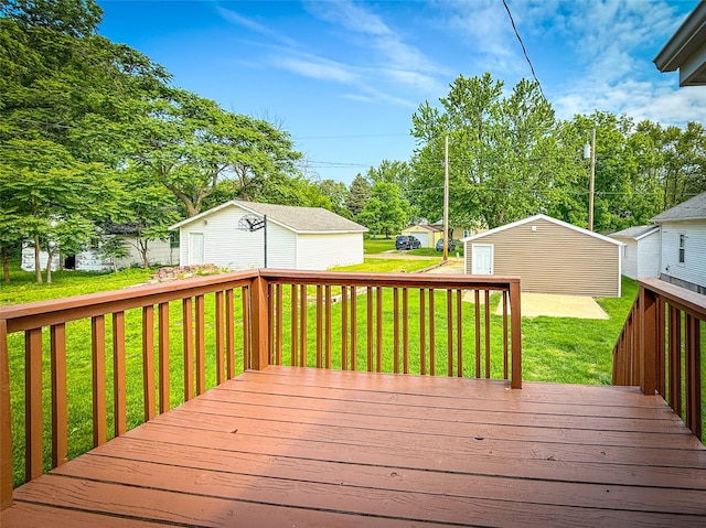 1545 5th St, Boone, IA 50036 - wooden terrace featuring an outbuilding, a yard, and view of wooded area