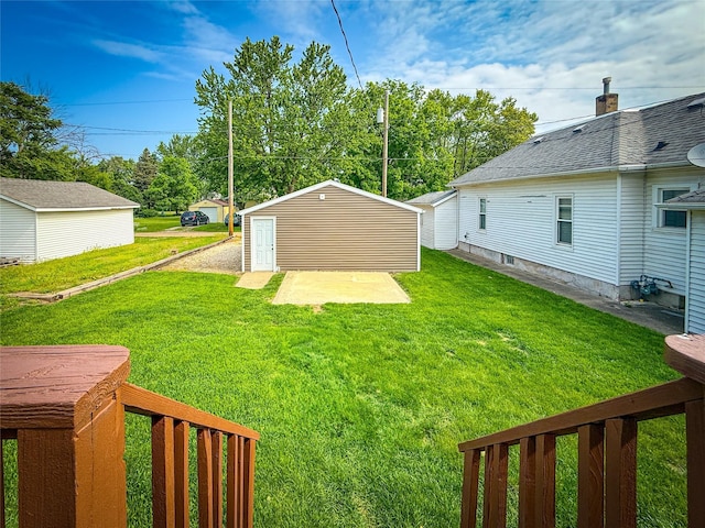 1545 5th St, Boone, IA 50036 - view of grassy yard featuring an outdoor structure