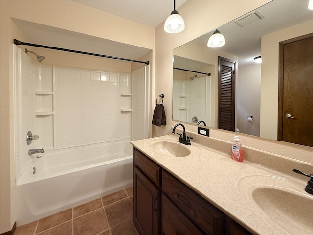 1545 5th St, Boone, IA 50036 - full bath featuring shower / bathtub combination, double vanity, and tile patterned flooring